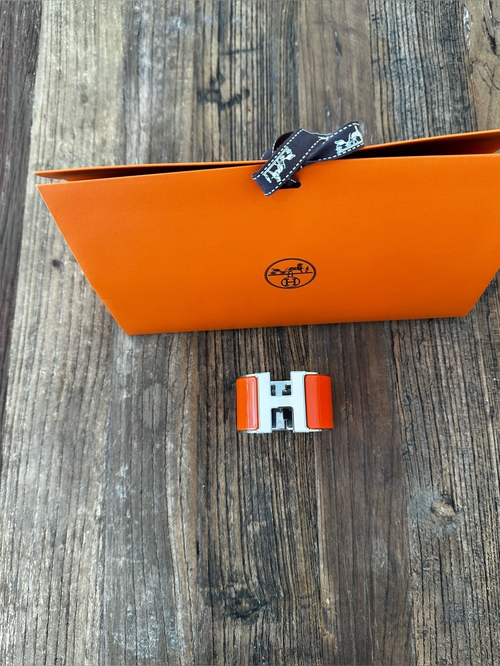 Hermes Orange and White Clic H Bracelet